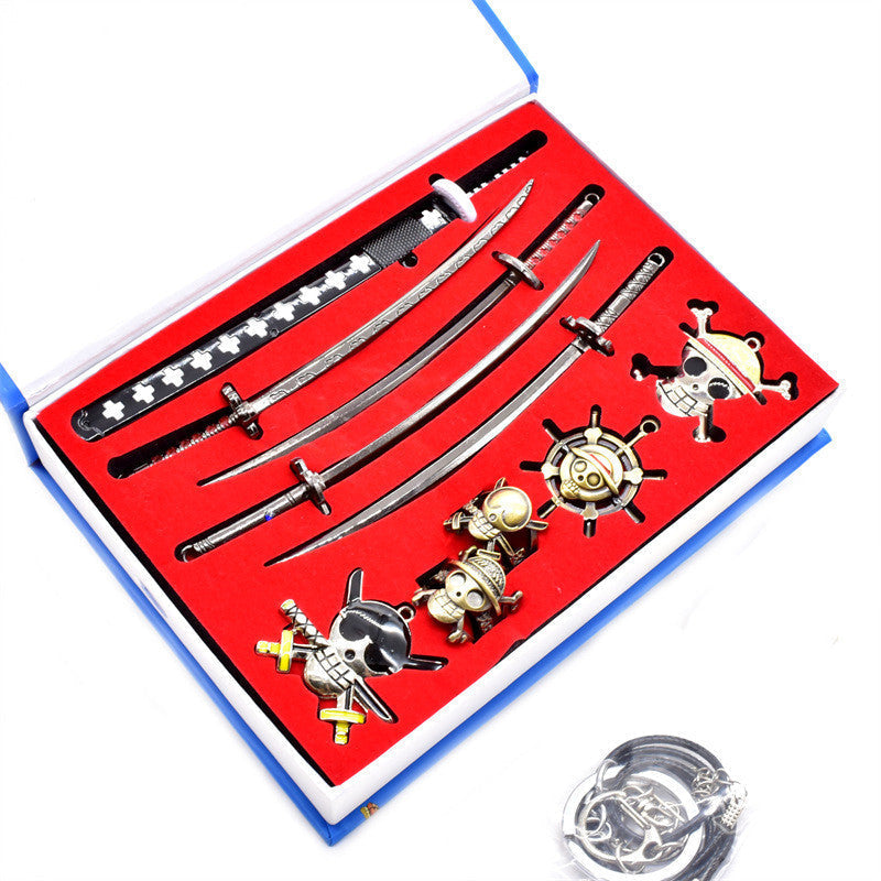 One Piece Zoro Mini Katana Collection Set 10Pcs, Metal Mini Sword Replica with Straw Hat Pirates Jolly Roger Pendant, Anime Weapon Model Keychain Gift Box, One Piece Collectible Desk Decor, Fan Merch Gift