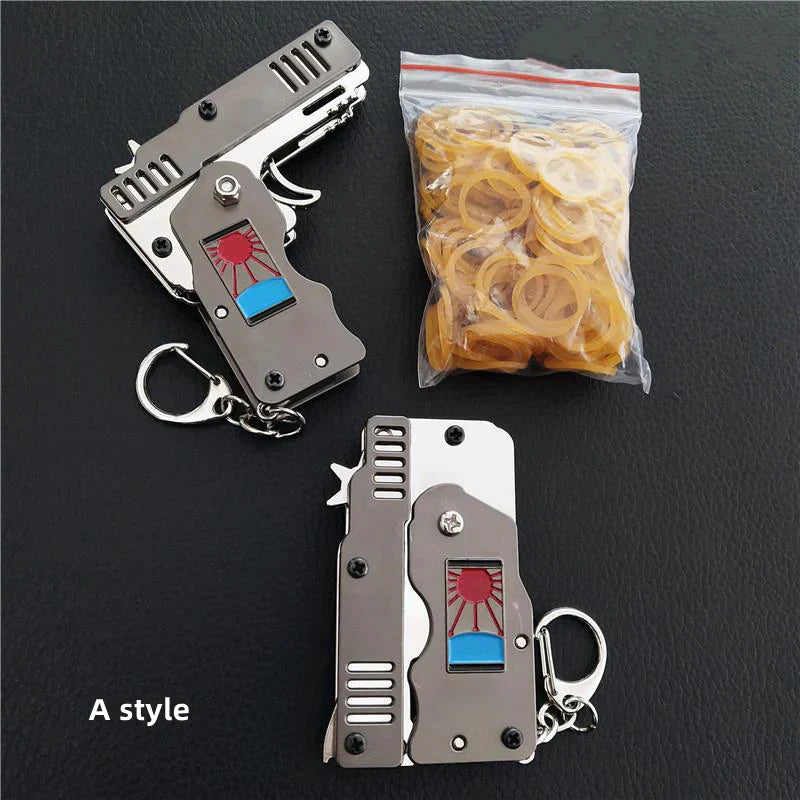 Demon Slayer Folding Rubber Band Gun Keychain Toy, Mini Metal Pocket Rubber Band Shooter, Kamado Tanjiro Themed Rubberband Launcher with Rubber Bands & Target, Novelty Anime Toy Gift for Fans
