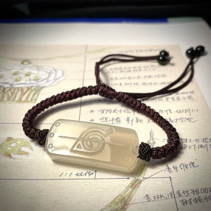 Naruto Ninja Forehead Guard Style Braided Bracelet, Anime Konoha / Cloud Village Symbol Carved Stone Wristband, Adjustable Rope Bracelet, Cosplay Jewelry Accessory, Collectible Gift for Naruto Fans